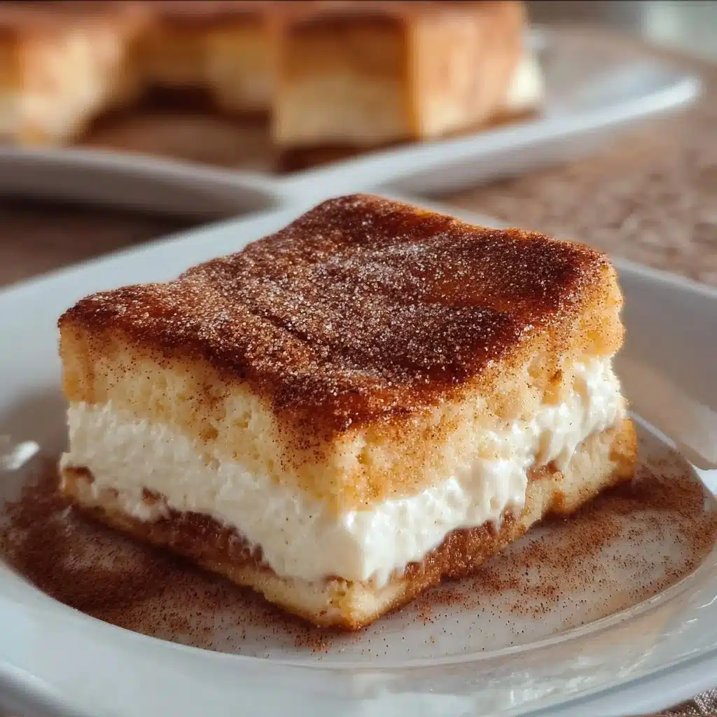 Delicious Churro Cheesecake topped with cinnamon and sugar