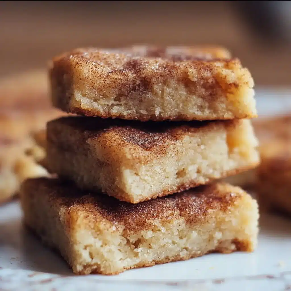 Delicious easy cinnamon sugar blondies with a sprinkle of cinnamon on top.