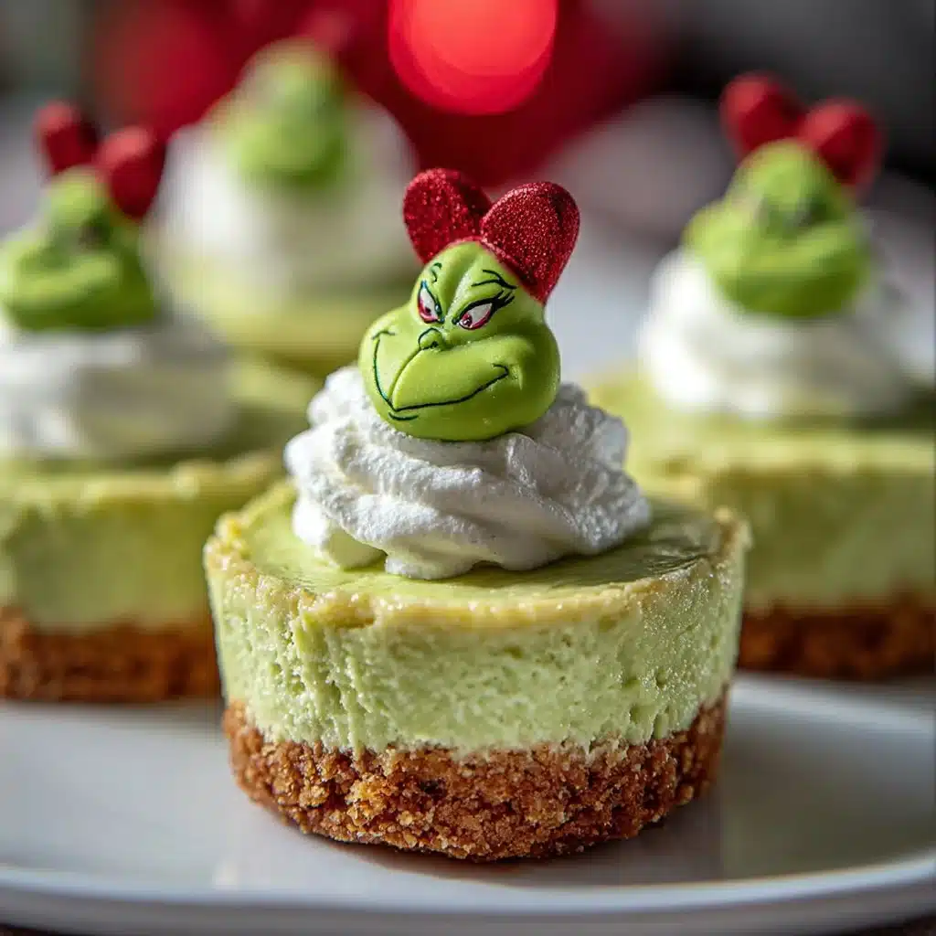 Festive Grinch mini cheesecakes decorated for the holiday season