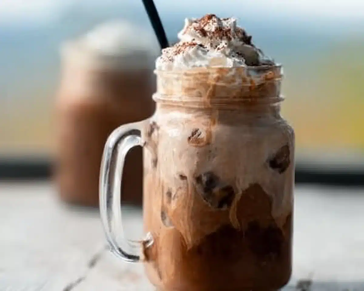 Delicious mocha iced coffee with chocolate and whipped cream
