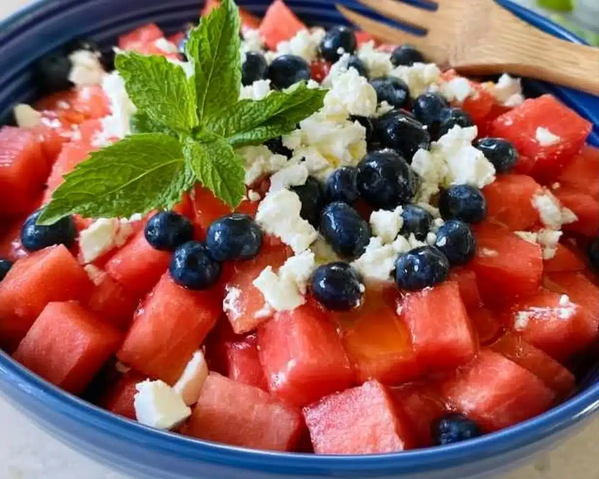 Delicious Watermelon Blueberry Feta Salad garnished with fresh mint